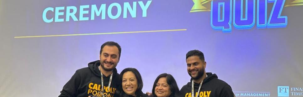 Four Cal Poly Pomona students holding up their award