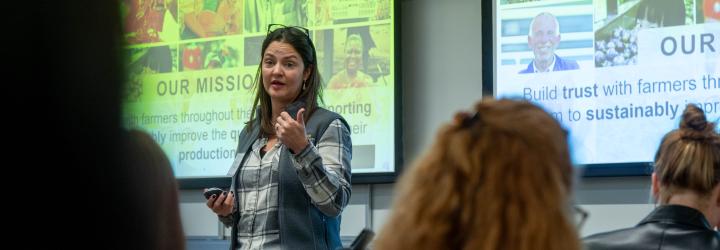 woman giving a presentation in classsroom
