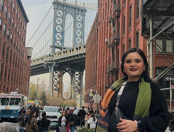 Marisol Ibarra with the Brooklyn Bridge in the background