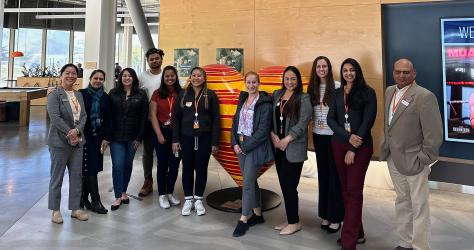 students inside Genentech offices