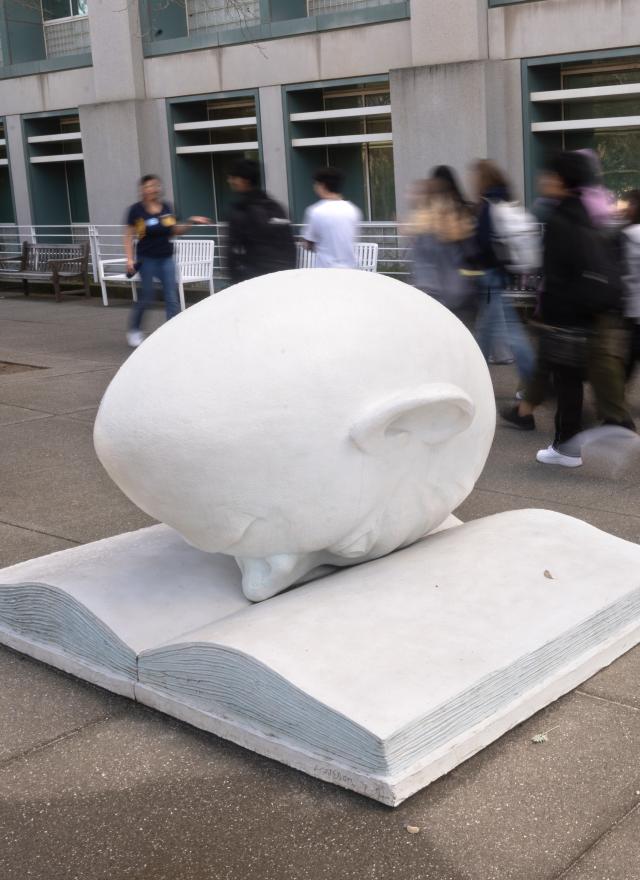 Egghead statue in front of Shields Library