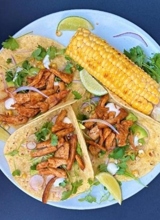 a plate of tacos served with Yeti Food meat alternative 