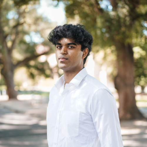 Anirudh Murugesan standing outside