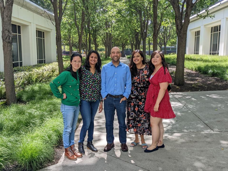 Assistant Professor Mike Palazzolo and a group of MBA students