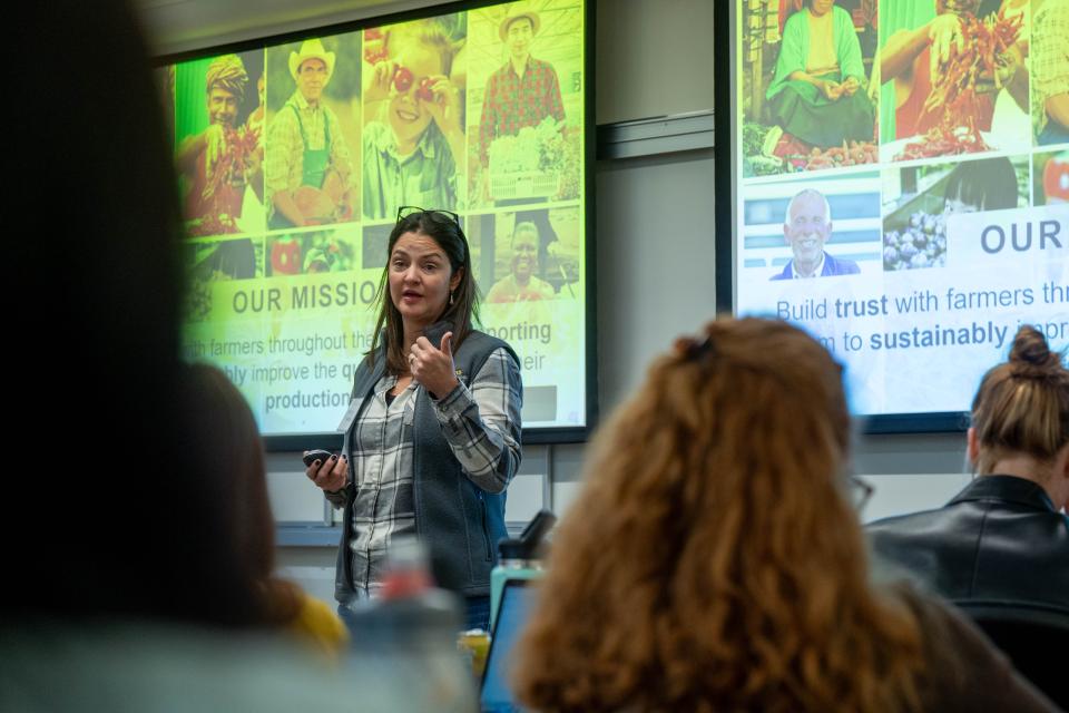 woman giving a presentation in classsroom