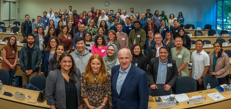 Warner Thomas with MBA students in classroom