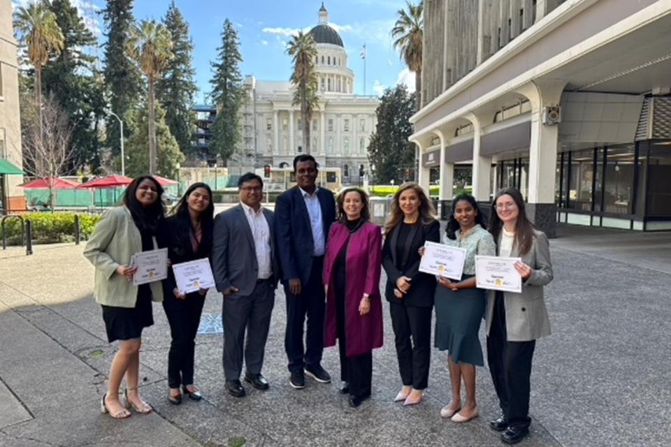 MSBA students holding up certificates in in front of Sacramento capitol
